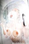 Busty MILF Nicole Aniston licks the steamy walls of the shower stall