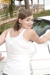 Solo girl Christy Marks wetting and soaping hooters while washing car on lawn