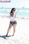 Latina female Daylene Rio releases her massive tits from bikini top