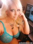 Platinum blonde bombshell Alura Jenson baring big tits for selfie