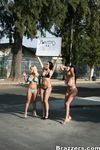 3 busty chicks in bikinis bang a big dick while working at the car wash