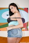 Solo girl Gianna Michaels uncovers her big tits and butt as she disrobes