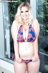 Blonde plumper Codi Vore releases her huge boobs from her bikini top