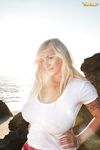 Chunky blonde September Carrino wetting white T-shirt to highlight nipples