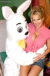Big boobed blonde chick gets banged by a guy in a rabbit costume