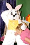 Big boobed blonde chick gets banged by a guy in a rabbit costume