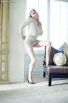 Top heavy blonde MILF Kelly Madison showing off sleek legs in high heels