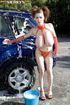 European MILF Merilyn Sakova washes a car with her massive tits hanging free