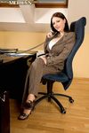 Hot secretary Merilyn Sakova strips and masturbates while on the phone