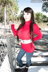 Asian girl with long hair Hitomi fills out her red sweater in non nude action