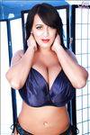 Big tit pornstar and model Leanne Crow houses her big knockers in bra