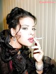 Busty stocking and lingerie clad MILF Linsey Dawn McKenzie having a smoke