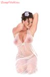 Buxom Linsey Dawn poses to flaunt her droopy tatas in sheer lingerie