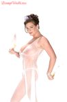 Solo girl Linsey Dawn McKenzie models enticingly in revealing lingerie