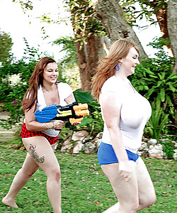 3 obese females rip off each others wet T-shirts while playing outdoor games