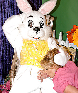 Big boobed blonde chick gets banged by a guy in a rabbit costume