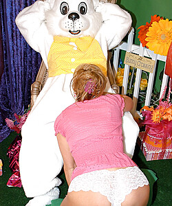 Big boobed blonde chick gets banged by a guy in a rabbit costume