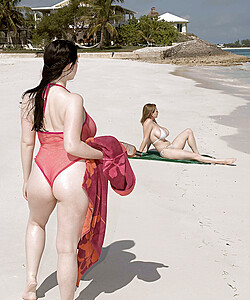 Plump female Christy Mark and her big boobed friend have lesbian sex on beach