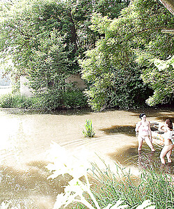 Shione and her busty lesbian friend toying each other by the river