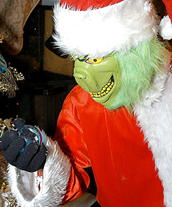 Big boobed blonde chick gets banged by the Grinch in a Santa suit at Christmas