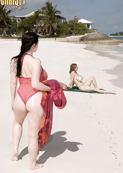 Plump female Christy Mark and her big boobed friend have lesbian sex on beach